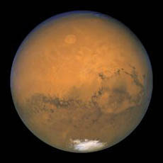 허블우주망원경이 지난 8월 27 일 화성의 대접근 때 찍은 화성 의 모습. 행성 전체가 불타는 사 막같다.